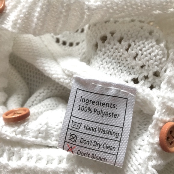 Knitted Baby Onesie With Buttons - Picture 4 of 10